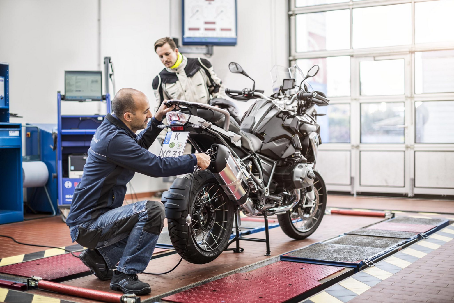 Belgian motor inspection. What is being inspected? Bike...