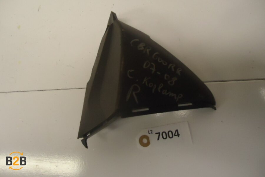 cover, cover naast koplamp